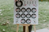 a wedding seating chart done with vinyl and florals is a great stationary idea for a themed wedding