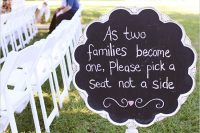 an elegant and refined chalkboard sign in a creative frame and with a stand is a lovely idea for a vintage wedding