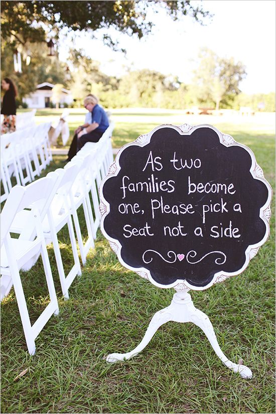 an elegant and refined chalkboard sign in a creative frame and with a stand is a lovely idea for a vintage wedding