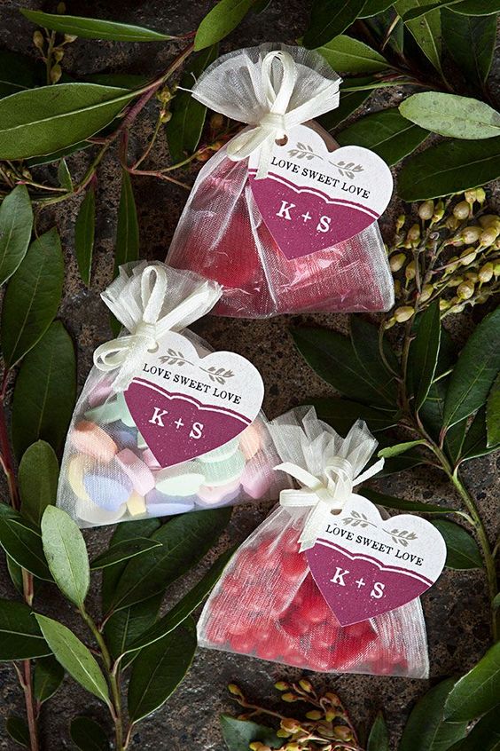 assorted candies in packs with tags are a timeless favor idea for rehearsal dinners and weddings