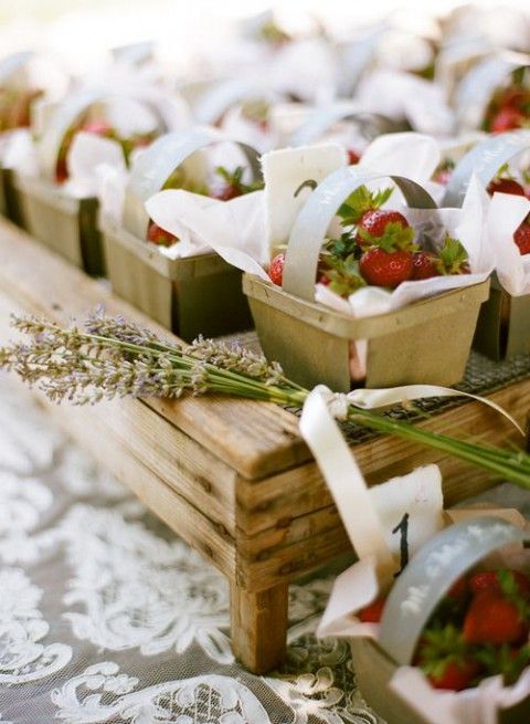 mini wooden baskets with fresh strawberries and paper are perfect for summer weddings and rehearsal dinners