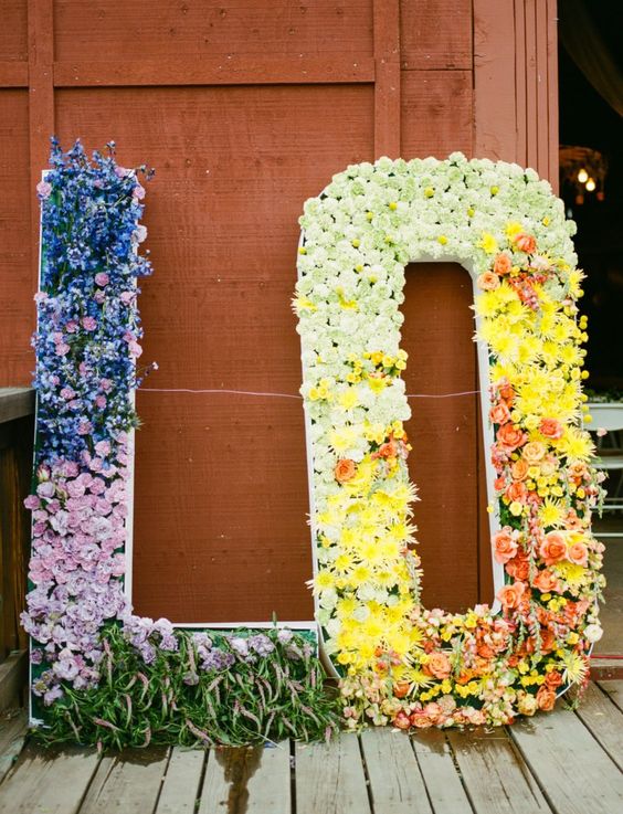 oversized floral and greenery letters in bold colors will give fun vibes to your summer wedding