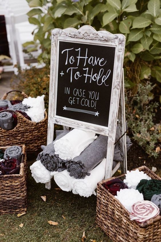 place a chalkboard sign in a whitewashed frame in a place where you serve or offer wedding favors