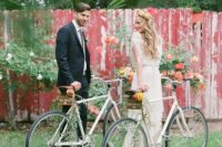 ride bikes decorated with blooms and greenery at your wedding to make a sweet escape or just for fun