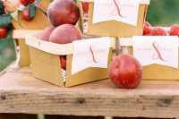 wooden baskets with apples and fresh berries are amazing to serve your foodie wedding favors