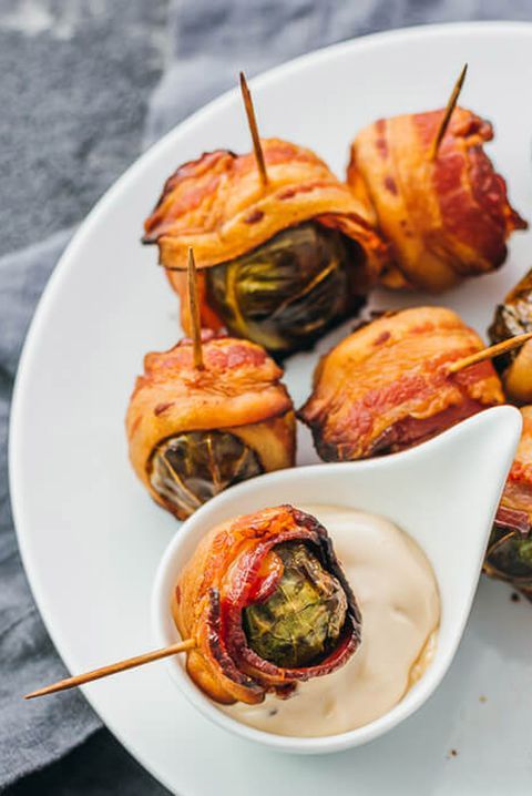 Brussels sprouts wrapped with bacon and with a tasty dip are very hearty fall wedding appetizers