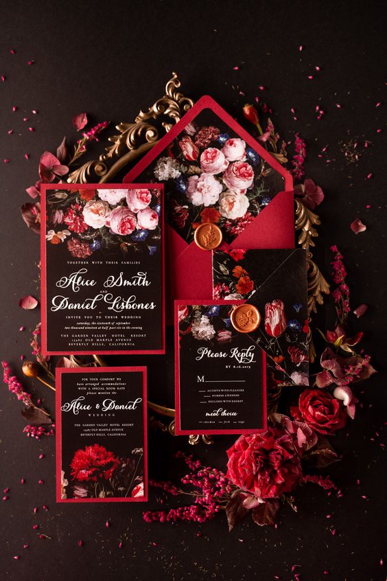 a crimson wedding invitation suite with printed florals and seals plus calligraphy is a lovely idea for a fall wedding