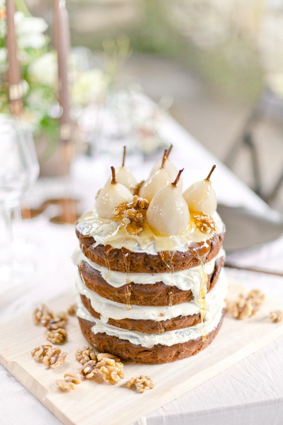 a delicious naked wedding cake topped with pears, caramel and walnuts is a fantastic idea for a fall boho wedding