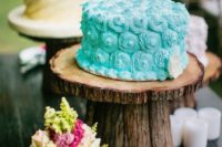a small tiffany blue shell-inspired wedding cake for a beahc or coastal wedding