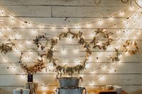 an arrangement of fall wreaths covered with pampas grass and leaves is a lovely idea for this fall boho or rustic wedding