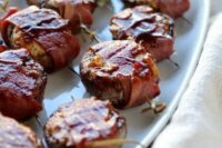 bacon wrapped cheese stuffed mushrooms are a delicious and hearty fall or winter wedding appetizers