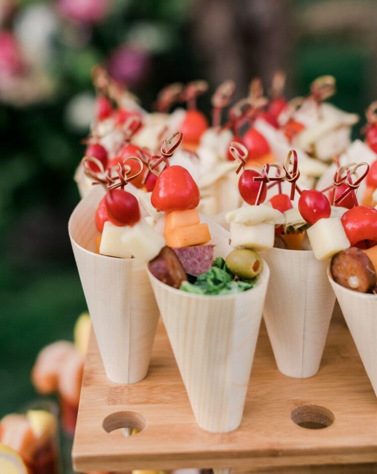 charcuterie cones are a fantastic cocktail hour wedding appetizer that is very trendy at the same time and lets everyone art comfortably