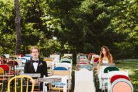 colorful mismatching chairs are great for a super relaxed, fun, backayrd wedding and they won’t break the budget