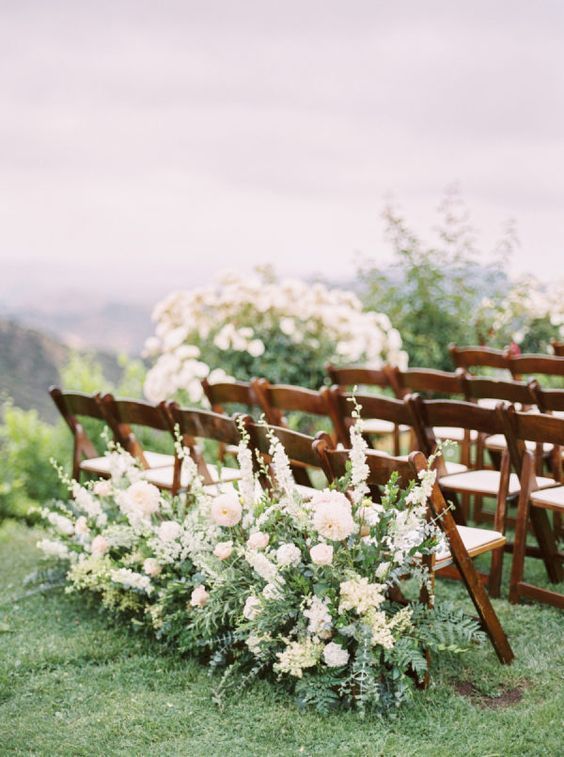 dark-stained white chairs, greenery and white blooms are great for rustic garden wedding ceremony, they look elegant together