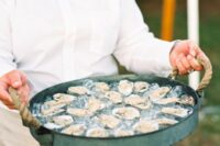 fresh oysters are cocktail hour appetizers that literally can’t be beaten – serve them in ice in trays and let your guests enjoy