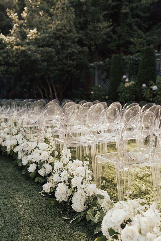 ghost chairs paired with white blooms are always a super refined and chic idea for a modern wedding