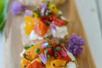 mini tarts with cream cheese, fresh veggie salad and herbs and blooms are romantic and cute wedding appetizers