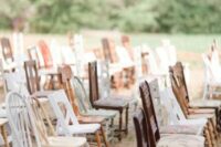 mismatching vintage chairs of various shades of stain and white ones are great for a vintage wedding or a rustic one