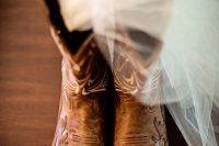 pretty brown patterned cowboy boots are always a good idea to finish off a boho or rustic bridal look