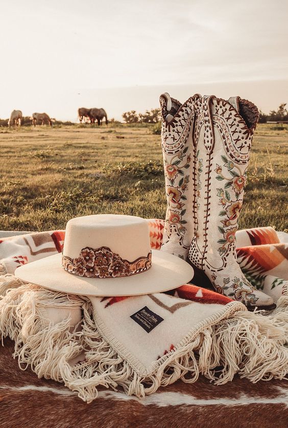 rustic and boho bridal accessories - painted and embroidered tall cowboy boots, a matching hat, a pretty coverup will make any bridal look very rustic