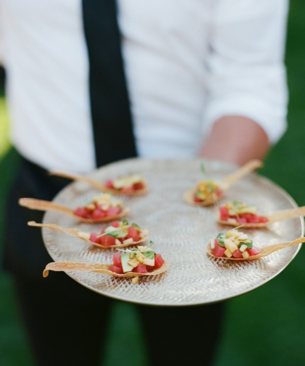 tuna tartare bites with avocado and corn served in wonton spoons are delicious and refined cocktail hour appetizers