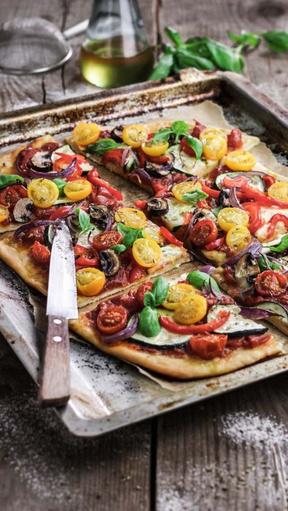 vegan pizza with various tomatoes, eggplants, peppers is an amazing idea for the fall, use all the fresh veggies
