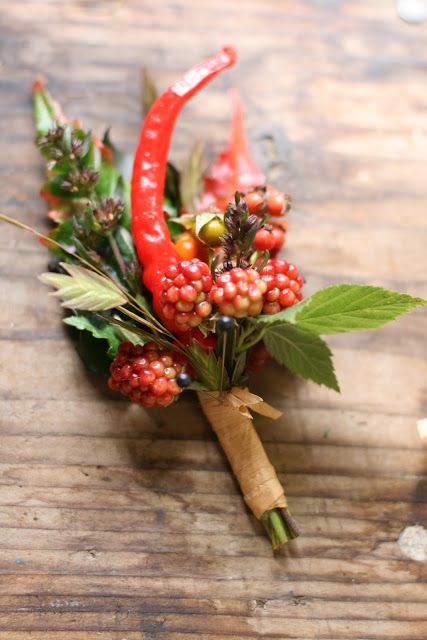 a bad ass chillie pepper and blackberries and leaves boutonniere will make a statement