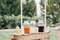 a rustic wooden pallet wedding drink bar is veyr easy to build and looks simple and cute, you may also paint or stain the bar