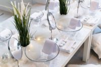 a spa bridal shower setting with mirrors, glass bowls, lights and various kinds of masks and treatments to try