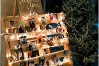 a wedding sign with lights and family photos is a cozy and homey wedding decoration for every wedding