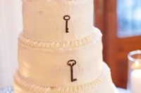a minimalist buttercream wedding cake