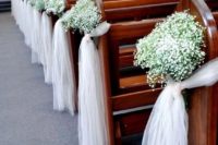 baby’s breath and white tulle wedding aisle decorations for an elegant and rustic feel