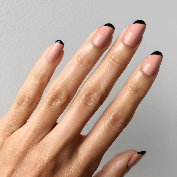 color block nude and black nails are a fresh take on classic French manicure and it looks bold