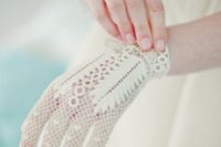 elegant white crocheted gloves with lovely patterns are ethereal and very chic for a vintage-loving bride