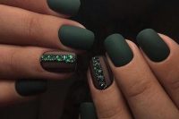 matte hunter green nails and heavily embellished emerald accent nails are amazing for a glam fall bride