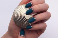 matte navy nails with gold glitter half moons are lovely, bold, jewel-toned nails for a fall bride
