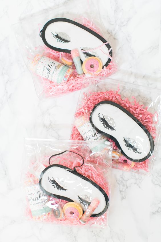 spa bridal shower favors with cute glam sleep masks, lip glosses, creams and other stuff you may need