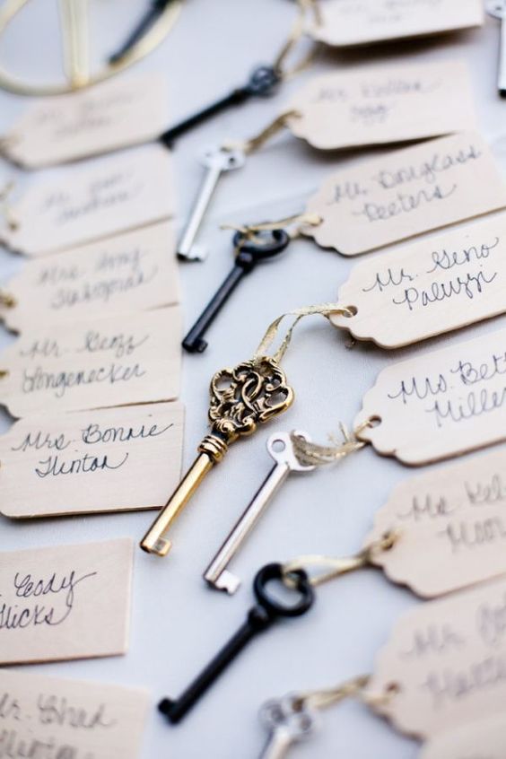 wedding escort cards with mismatching vintage keys are a beautiful idea for a vintage-infused wedding