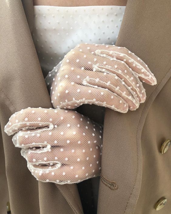 white mesh gloves with polka dots look chic and romantic and will give a refined girlish feel to your look