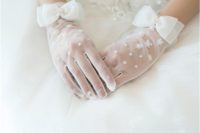 white tulle gloves with embellishments, floral appliques and large bows accented with pearls
