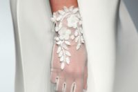 white tulle gloves with floral and botanical appliques are a fresh take on classics with a girlish feel