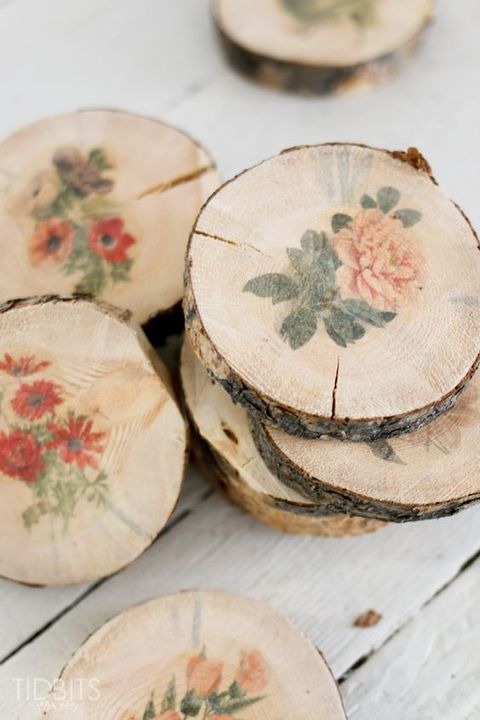 wood slices with bright floral stencils can be used for wedding decor or give as wedding favors, they are great for a rustic wedding