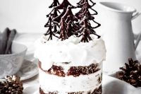 a chocolate gingerbread wedding cake with orange jam and mascarpone whipped cream plus chocolate Christmas trees on top is amazing for a rustic winter wedding