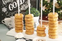 a cool and cute donut stacker is a nice and trendy idea for your wedding hot chocolate bar