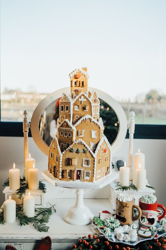 a creative gingerbread house Christmas wedding cake is a gorgeous holiday alternative to a usual one and it looks fantastic