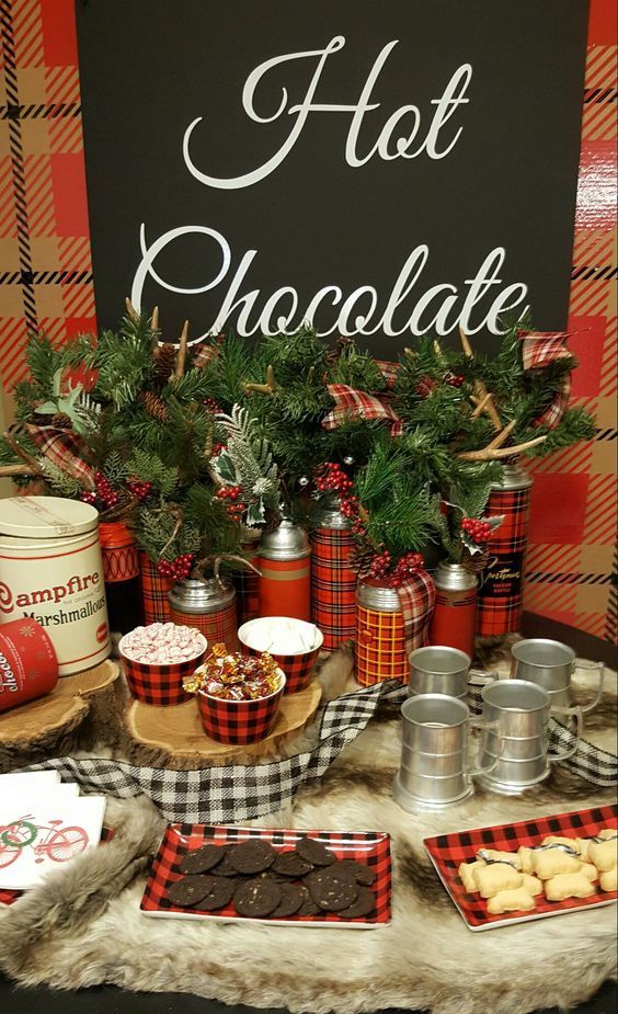 a sweet and cozy hot chocolate bar with plaid touches, an evergreen and berry arrangement with antlers and metal mugs