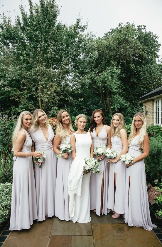 chic and sexy off-white bridesmaid maxi dresses with plunging necklines, ties and knots and front slits