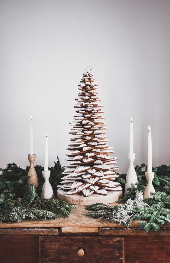 gingerbread cookies spiced up with cardamom forming a Christmas tree with a star topper are a fantastic alternative to a usual winter wedding cake