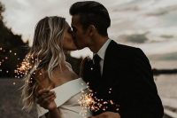 go for wedidng portraits with sparklers, they will make your wedding photos cooler and bolder