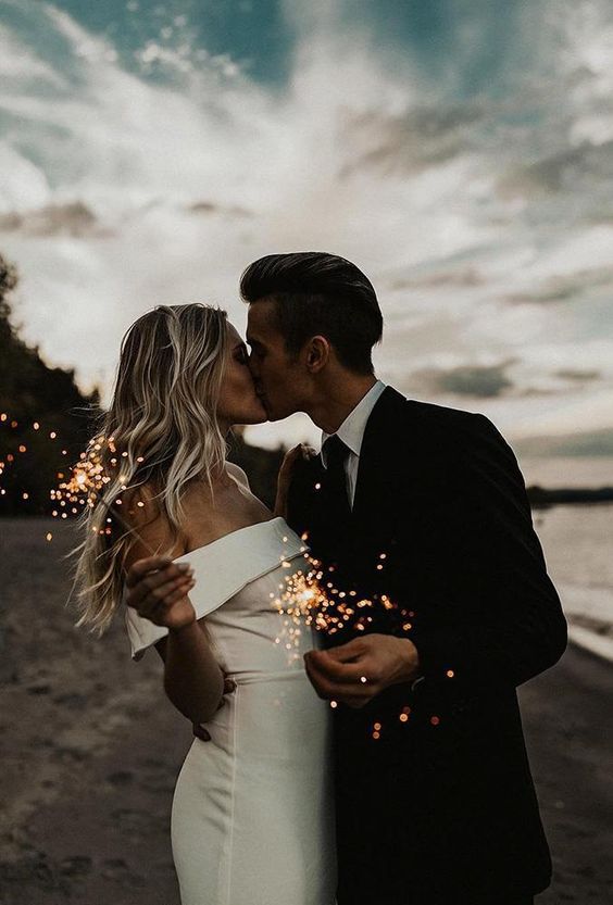 go for wedidng portraits with sparklers, they will make your wedding photos cooler and bolder